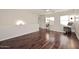 Bright loft area with hardwood floors, a ceiling fan, and ample natural light at 1293 E Clifton Ave, Gilbert, AZ 85295