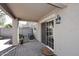 Cozy covered patio with brick flooring and sliding glass doors for easy indoor-outdoor flow at 1293 E Clifton Ave, Gilbert, AZ 85295