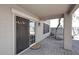 Covered patio with brick flooring and sliding glass doors, perfect for outdoor living at 1293 E Clifton Ave, Gilbert, AZ 85295
