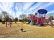 Vibrant community playground with colorful structures and soft landing for of all ages at 1293 E Clifton Ave, Gilbert, AZ 85295