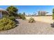 Low maintenance backyard with desert landscaping, gravel, and a block wall fence at 13014 W La Terraza Dr, Sun City West, AZ 85375