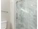 Modern bathroom featuring a glass shower with gray tile surround and updated fixtures at 15050 N Thompson Peak Pkwy # 2036, Scottsdale, AZ 85260