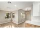 Bright kitchen boasts white cabinets, new countertops, recessed lighting, and natural light at 15050 N Thompson Peak Pkwy # 2036, Scottsdale, AZ 85260