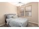 Comfortable bedroom with neutral color scheme and lots of light at 15221 N Clubgate Dr # 2012, Scottsdale, AZ 85254