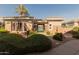 A beautiful clubhouse with a manicured lawn, perfect for relaxing with friends and neighbors at 15221 N Clubgate Dr # 2012, Scottsdale, AZ 85254