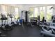 Bright gym featuring exercise equipment and natural light, making it the perfect place to get in shape at 15221 N Clubgate Dr # 2012, Scottsdale, AZ 85254