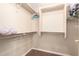Walk-in closet with shelving and ample storage space at 15221 N Clubgate Dr # 2012, Scottsdale, AZ 85254