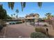 Expansive backyard featuring a gazebo with dining, lush landscaping, and relaxing lounging area at 15237 N 61St Dr, Glendale, AZ 85306