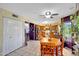 Cozy eat-in kitchen features a round dining table, wood cabinets, and stainless steel appliances at 15237 N 61St Dr, Glendale, AZ 85306
