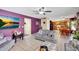 Open concept living room seamlessly connects to the kitchen and dining area at 15237 N 61St Dr, Glendale, AZ 85306