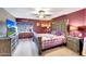 Cozy main bedroom features stylish decor, a large window, and modern furniture at 15237 N 61St Dr, Glendale, AZ 85306