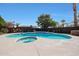 Well-maintained backyard pool and spa area with mature landscaping, perfect for a refreshing swim at 15237 N 61St Dr, Glendale, AZ 85306