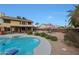 Spacious backyard featuring a beautiful pool, lounging area and landscaped garden, perfect for relaxation at 15237 N 61St Dr, Glendale, AZ 85306