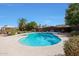Inviting backyard pool surrounded by lush landscaping, perfect for relaxation and outdoor enjoyment at 15237 N 61St Dr, Glendale, AZ 85306
