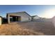 Expansive backyard with block fencing, offering privacy and potential for landscaping and outdoor enjoyment at 15764 W Beryl Ave, Waddell, AZ 85355