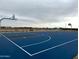 Community basketball court perfect for active residents and recreational fun at 15764 W Beryl Ave, Waddell, AZ 85355