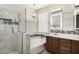 Bright bathroom with walk-in shower, tub, decorative tile and double sink vanity at 1783 W Homestead Dr, Chandler, AZ 85286
