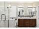 Bright bathroom featuring double sink vanity, walk-in shower, tub and neutral color palette at 1783 W Homestead Dr, Chandler, AZ 85286