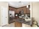 Well-equipped kitchen features stainless steel appliances and granite countertops at 1783 W Homestead Dr, Chandler, AZ 85286