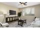 Inviting living room boasts a ceiling fan, area rug, and comfortable seating area at 1783 W Homestead Dr, Chandler, AZ 85286