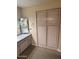 Bathroom with dual sinks and granite countertop, complemented by ample cabinet storage at 19224 N 93Rd Ave, Peoria, AZ 85382