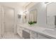 Bright bathroom features dual sinks, white marble counters, and modern fixtures, creating a clean and elegant space at 19400 N Westbrook Pkwy # 241, Peoria, AZ 85382