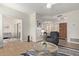 Bright living room with hardwood floors, comfortable seating, and a stylish rug at 19400 N Westbrook Pkwy # 241, Peoria, AZ 85382