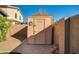 Outdoor storage shed in the backyard with brick paver flooring and landscaping along the perimeter at 2145 E Danbury Rd, Phoenix, AZ 85022