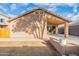 Backyard view with a covered patio that transitions effortlessly to indoor/outdoor living at 2444 S Terrell --, Mesa, AZ 85209