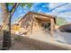 View of the backyard featuring a covered patio and low maintenance landscaping at 2444 S Terrell --, Mesa, AZ 85209
