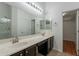 Bathroom with double sinks, a vanity, a large mirror, and ample counter space at 2444 S Terrell --, Mesa, AZ 85209