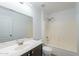 Bathroom with shower-tub combo, single sink vanity and large mirror at 2444 S Terrell --, Mesa, AZ 85209