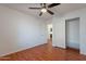 Bedroom featuring a ceiling fan, wood-look flooring and a closet at 2444 S Terrell --, Mesa, AZ 85209