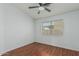 Bedroom with hardwood floors, ceiling fan, window and neutral color palette at 2444 S Terrell --, Mesa, AZ 85209
