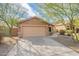 Charming single-story home featuring a neutral stucco exterior, well-kept landscaping, and a spacious two-car garage at 2444 S Terrell --, Mesa, AZ 85209