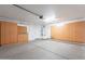 Spacious garage with ample storage cabinets, perfect for organizing tools and equipment at 2444 S Terrell --, Mesa, AZ 85209