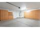 Spacious garage with custom cabinets, epoxy floors, and ample storage space at 2444 S Terrell --, Mesa, AZ 85209