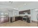 Stylish kitchen featuring stainless steel appliances, an open layout, and seamless connection to the living area at 2444 S Terrell --, Mesa, AZ 85209