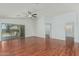 Spacious living room boasting hardwood floors, recessed lighting, and sliding glass doors to the outside at 2444 S Terrell --, Mesa, AZ 85209