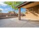 Relax on the covered patio overlooking the serene backyard, perfect for enjoying peaceful evenings at 2444 S Terrell --, Mesa, AZ 85209