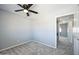 Comfortable bedroom with neutral color scheme and a glimpse into the hallway at 2724 W Mclellan Blvd # 116, Phoenix, AZ 85017