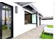 Outdoor area with a pass-through window to the kitchen, a modern design, and a relaxing lounge area at 3106 N Valencia Ln, Phoenix, AZ 85018