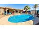 This beautiful home includes a refreshing pool and covered patio, ideal for outdoor living at 36579 W Barcelona Ln, Maricopa, AZ 85138
