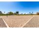 Sand volleyball court, providing a great space for outdoor recreation and friendly competition at 36579 W Barcelona Ln, Maricopa, AZ 85138