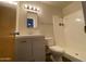 Bathroom featuring a shower-tub combo and vanity at 3810 W Belmont Ave, Phoenix, AZ 85051