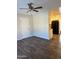 Open floor plan dining area with sleek wood flooring adjacent to the kitchen at 3810 W Belmont Ave, Phoenix, AZ 85051