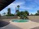 Outdoor in-ground pool with clear blue skies at 3810 W Belmont Ave, Phoenix, AZ 85051