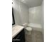 Clean bathroom with tiled shower-tub and updated vanity at 4007 W Rue De Lamour Ave, Phoenix, AZ 85029