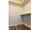 Walk-in closet with shelving provides ample storage space at 4007 W Rue De Lamour Ave, Phoenix, AZ 85029