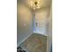 Stylish entryway with decorative light fixture at 4007 W Rue De Lamour Ave, Phoenix, AZ 85029